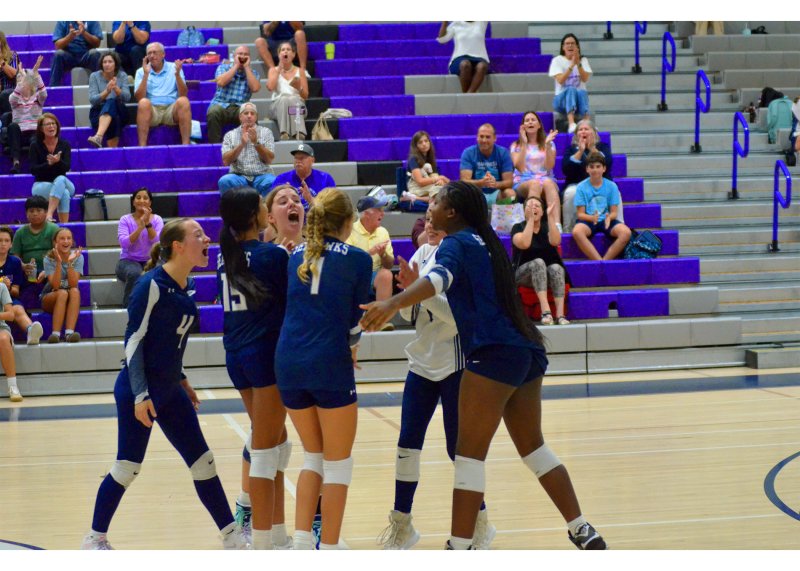 Sussex Academy’s JV celebrates its set win.